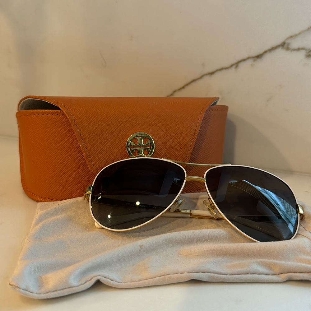 Tory Burch aviators with pouch and case. Minor scratches on lenses.
